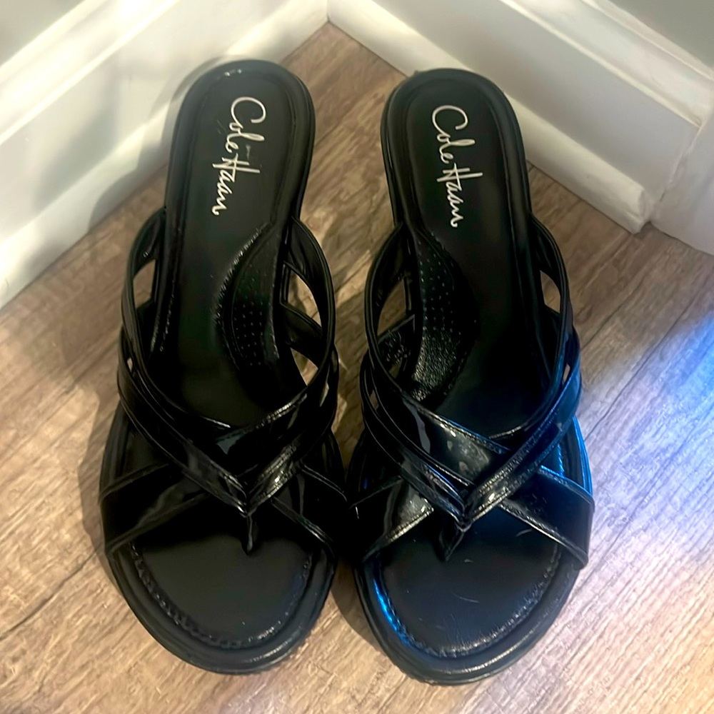 Black Cole Haan sandals with rubber sole